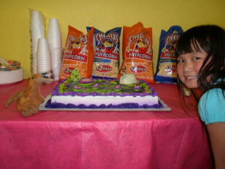 Kasen posing with her cake